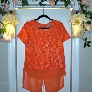 Gorgeous Sequined orange 🍊 blouse with slit cut on the back by Alberto Makali